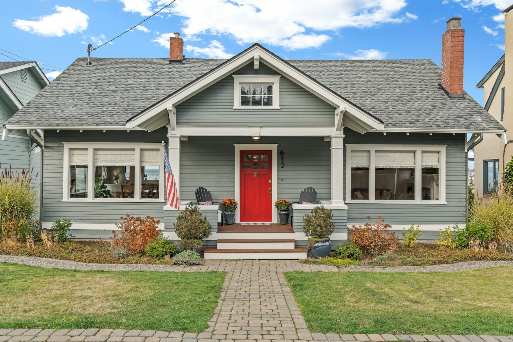 a gray house with red door, history of lathrop ca