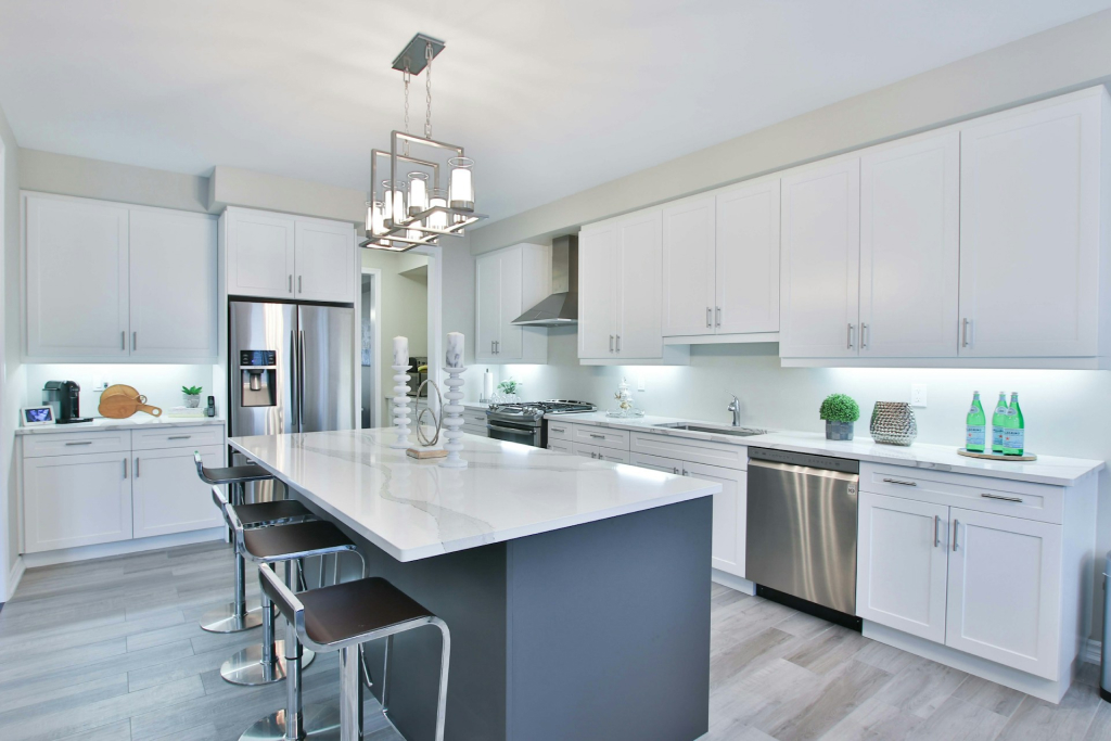 a beautiful white kitchen with grey accent, new construction homes in tracy ca